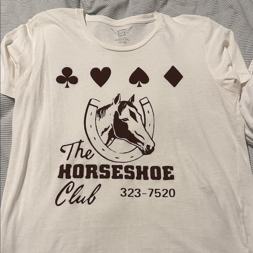 The Horseshoe Club White and Brown Graphic Tee from Free People